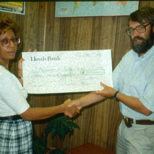 John Burton receiving a cheque John Burton receiving a cheque